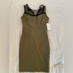 Green bodycon shift dress with lace detail
